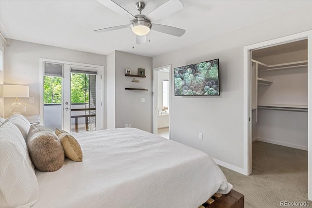 2420 S Gilpin St, Denver, CO 80210 - bedroom with carpet floors, access to outside, a walk in closet, and a ceiling fan