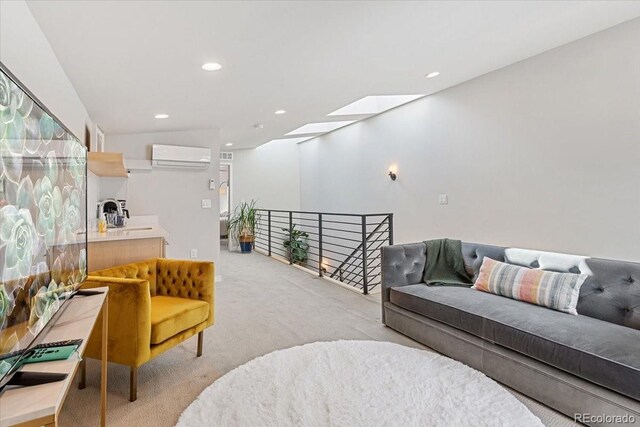 2420 S Gilpin St, Denver, CO 80210 - living room with a wall mounted AC, light carpet, and recessed lighting