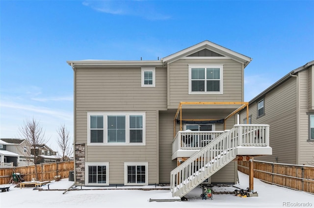 view of snow covered property