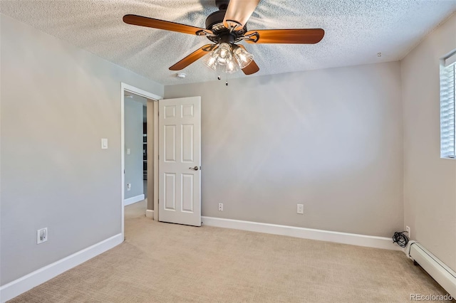 4812 W 8th Ave, Denver, CO 80204 - spare room featuring a textured ceiling, a baseboard radiator, ceiling fan, and light colored carpet