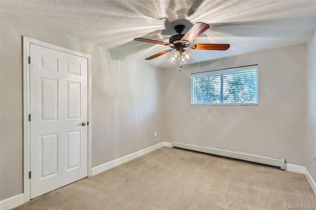 4812 W 8th Ave, Denver, CO 80204 - carpeted spare room with baseboard heating, a ceiling fan, and a textured ceiling