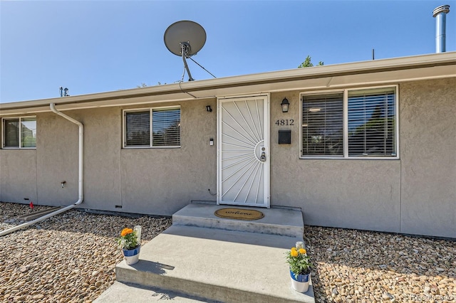 4812 W 8th Ave, Denver, CO 80204 - view of exterior entry with stucco siding