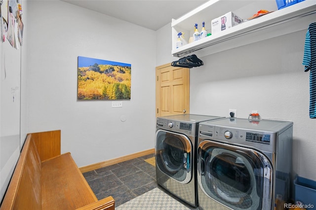 washroom featuring washer and dryer