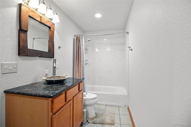 full bathroom featuring tile patterned flooring, shower / bath combination with curtain, vanity, and toilet