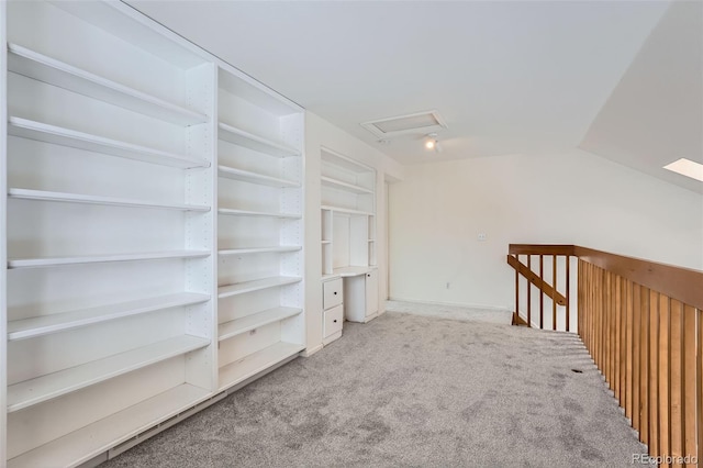 bonus room featuring light carpet