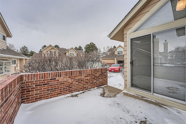 view of snow covered patio