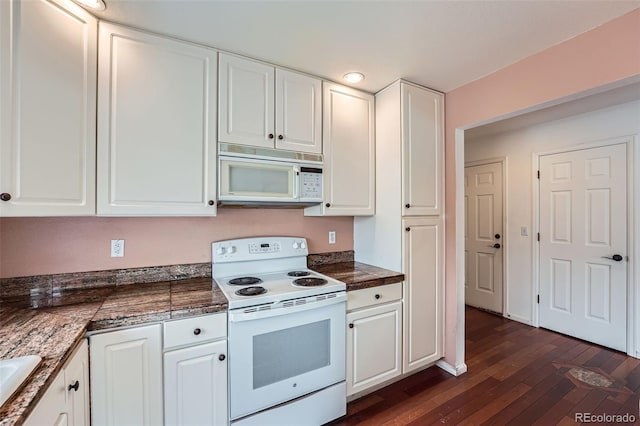 kitchen with white cabinets, white appliances, and dark wood-type flooring