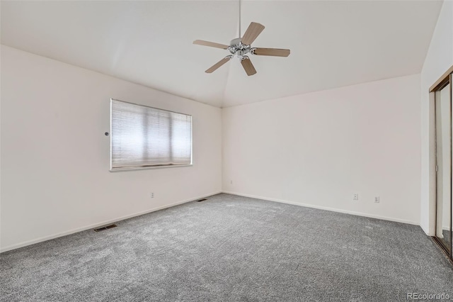 2121 S Troy Way, Aurora, CO 80014 - carpeted spare room with ceiling fan and lofted ceiling