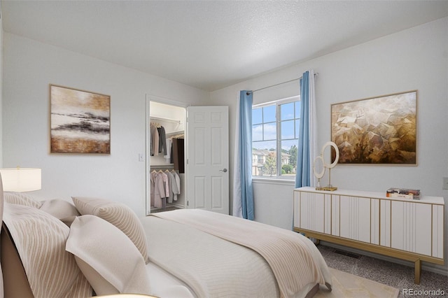 3000 E 112th Ave Unit 61, Northglenn, CO 80233 - carpeted bedroom with a spacious closet