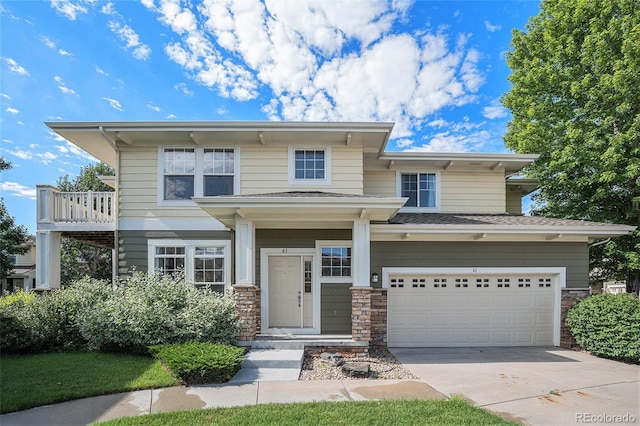 3000 E 112th Ave Unit 61, Northglenn, CO 80233 - view of front of home with concrete driveway, a garage, stone siding, and roof with shingles