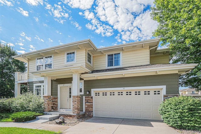 3000 E 112th Ave Unit 61, Northglenn, CO 80233 - view of front facade with a garage, driveway, and stone siding