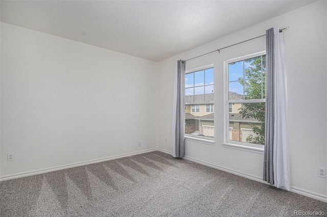 3000 E 112th Ave Unit 61, Northglenn, CO 80233 - empty room featuring carpet and baseboards