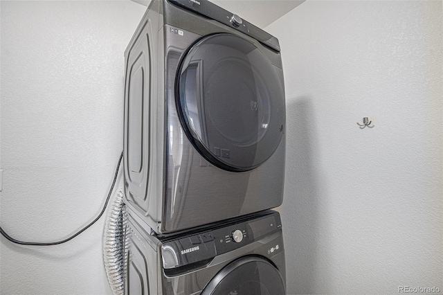 3000 E 112th Ave Unit 61, Northglenn, CO 80233 - washroom with stacked washing machine and dryer