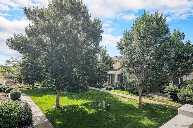 3000 E 112th Ave Unit 61, Northglenn, CO 80233 - view of front facade with a front yard