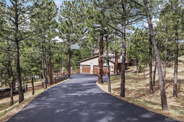 2857 Hiwan Dr, Evergreen, CO 80439 - view of road featuring aphalt driveway