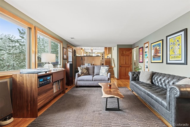 2857 Hiwan Dr, Evergreen, CO 80439 - living area featuring visible vents and wood finished floors
