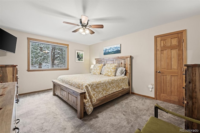 2857 Hiwan Dr, Evergreen, CO 80439 - bedroom with baseboards, light colored carpet, and a ceiling fan