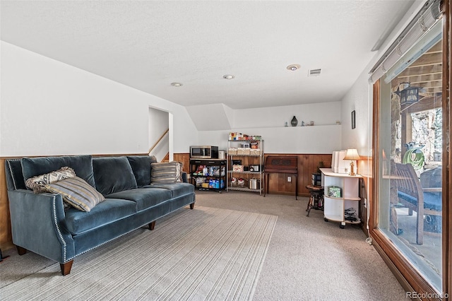 2857 Hiwan Dr, Evergreen, CO 80439 - carpeted living area with a wealth of natural light, recessed lighting, visible vents, and a textured ceiling