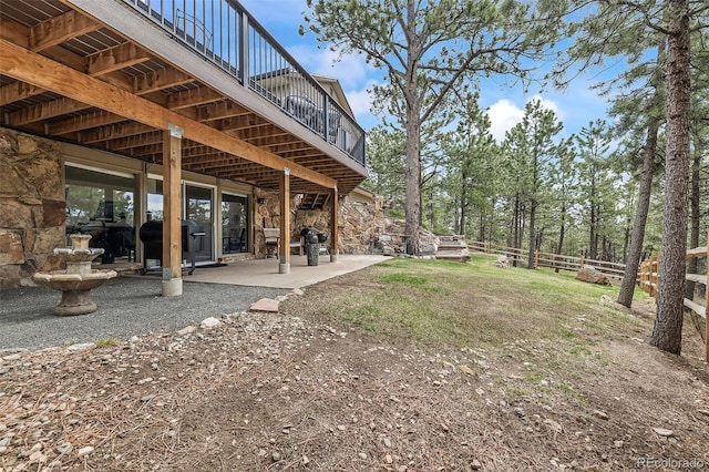 2857 Hiwan Dr, Evergreen, CO 80439 - view of yard featuring a patio area and fence