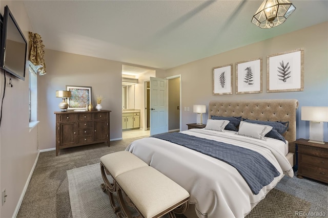 8164 Flower Cir, Arvada, CO 80005 - bedroom featuring carpet, baseboards, and ensuite bathroom