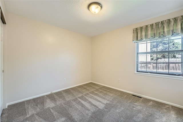 8164 Flower Cir, Arvada, CO 80005 - spare room with carpet flooring and baseboards