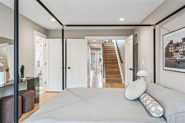 bedroom featuring light wood-type flooring