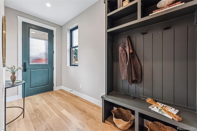 mudroom with light hardwood / wood-style flooring