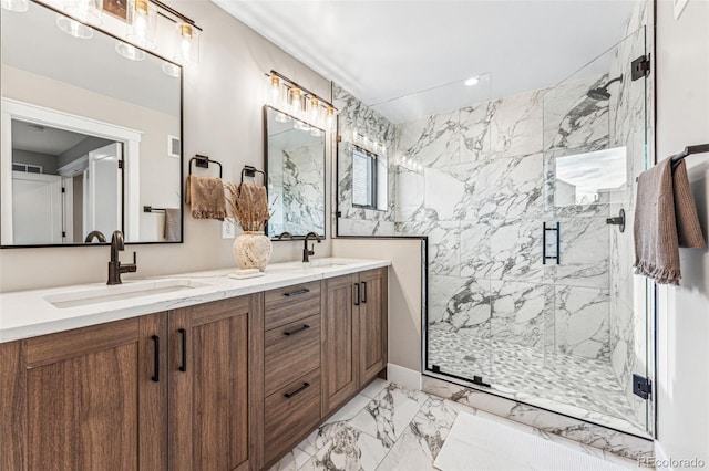 bathroom with vanity and a shower with shower door