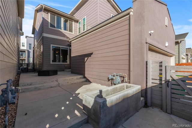 rear view of property with a patio