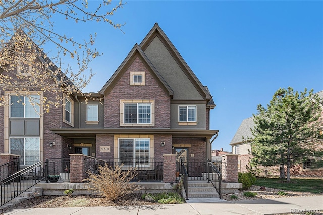 860 Bristle Pine Cir Unit A, Highlands Ranch, CO 80129 - view of front of property featuring brick siding