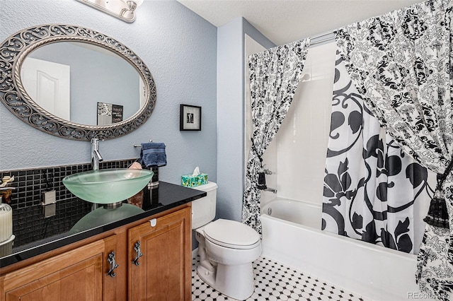 860 Bristle Pine Cir Unit A, Highlands Ranch, CO 80129 - full bath featuring a textured wall, vanity, shower / bath combo, and a textured ceiling