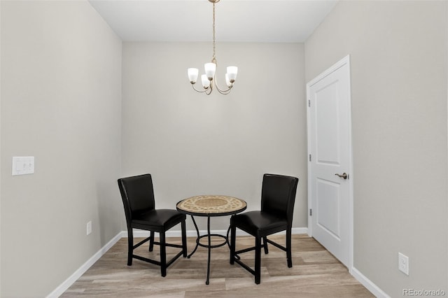 19629 W 93rd Dr Unit C, Arvada, CO 80007 - sitting room with wood finished floors and a chandelier