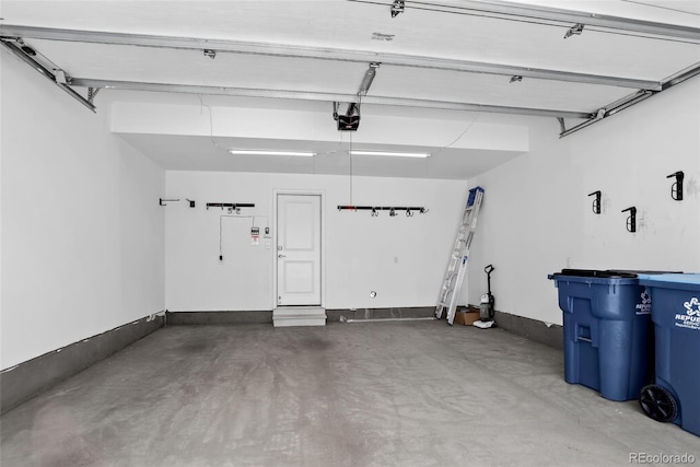 19629 W 93rd Dr Unit C, Arvada, CO 80007 - garage featuring a garage door opener