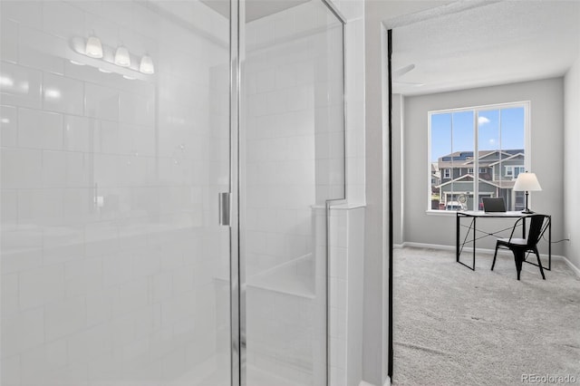 19629 W 93rd Dr Unit C, Arvada, CO 80007 - bathroom with a shower stall and baseboards