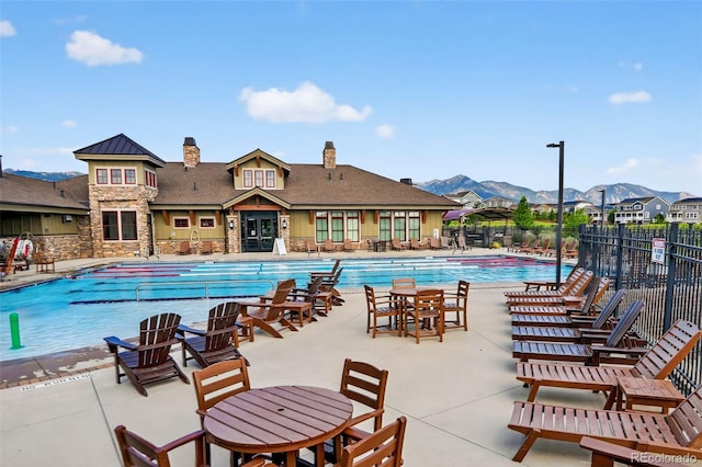 19629 W 93rd Dr Unit C, Arvada, CO 80007 - community pool with a mountain view and a patio area