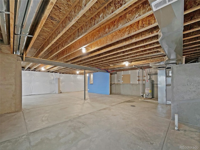 12742 E 104th Dr, Commerce City, CO 80022 - unfinished basement with gas water heater