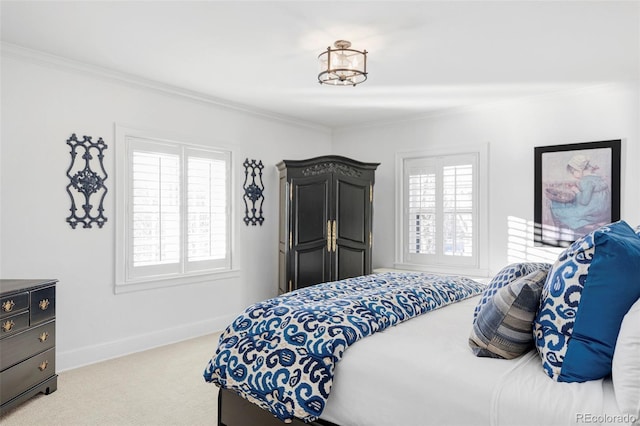 bedroom with multiple windows, crown molding, and light carpet