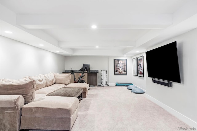 carpeted living room with beam ceiling