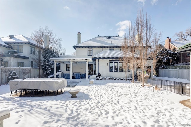 view of snow covered property