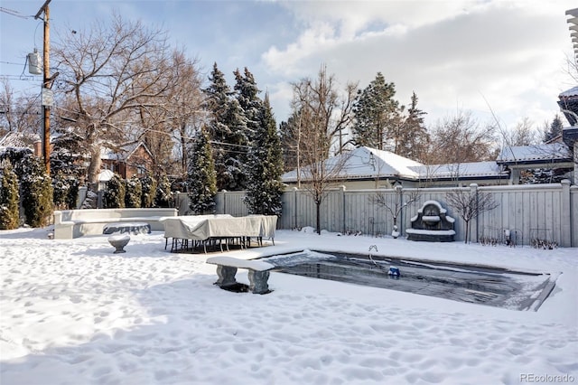 view of yard covered in snow