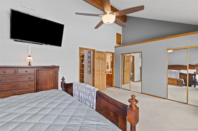 7624 S Cove Cir, Centennial, CO 80122 - carpeted bedroom with multiple closets, high vaulted ceiling, and ceiling fan