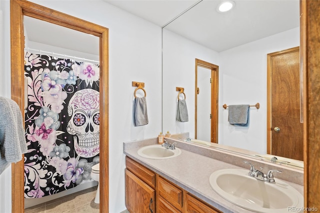 7624 S Cove Cir, Centennial, CO 80122 - full bathroom with double vanity and toilet