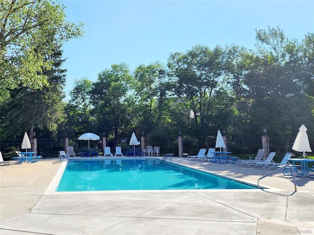7624 S Cove Cir, Centennial, CO 80122 - community pool featuring a patio