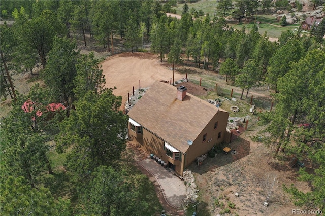 688 Obsidian Dr, Florissant, CO 80816 - aerial overview of property's location with a tree filled landscape