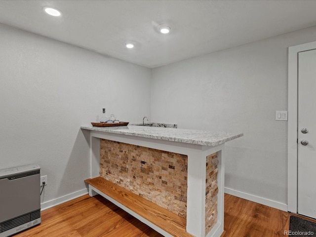 8422 S Ault Ln, Morrison, CO 80465 - bar area featuring baseboards and light wood-type flooring
