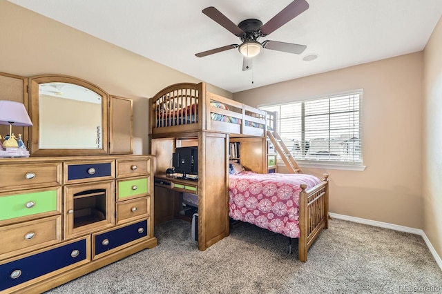 carpeted bedroom with baseboards