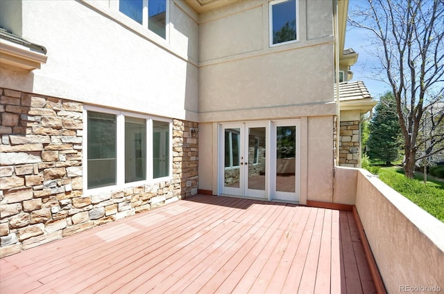 wooden deck featuring french doors