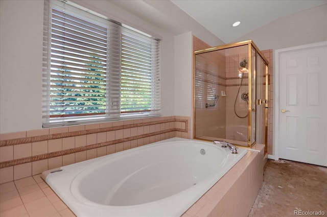 full bath featuring a stall shower and a bath