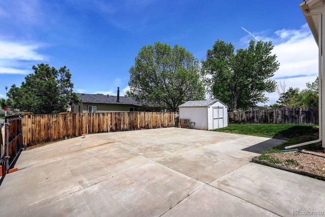 view of patio with a storage unit and an outdoor structure
