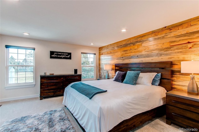 carpeted bedroom featuring recessed lighting and baseboards